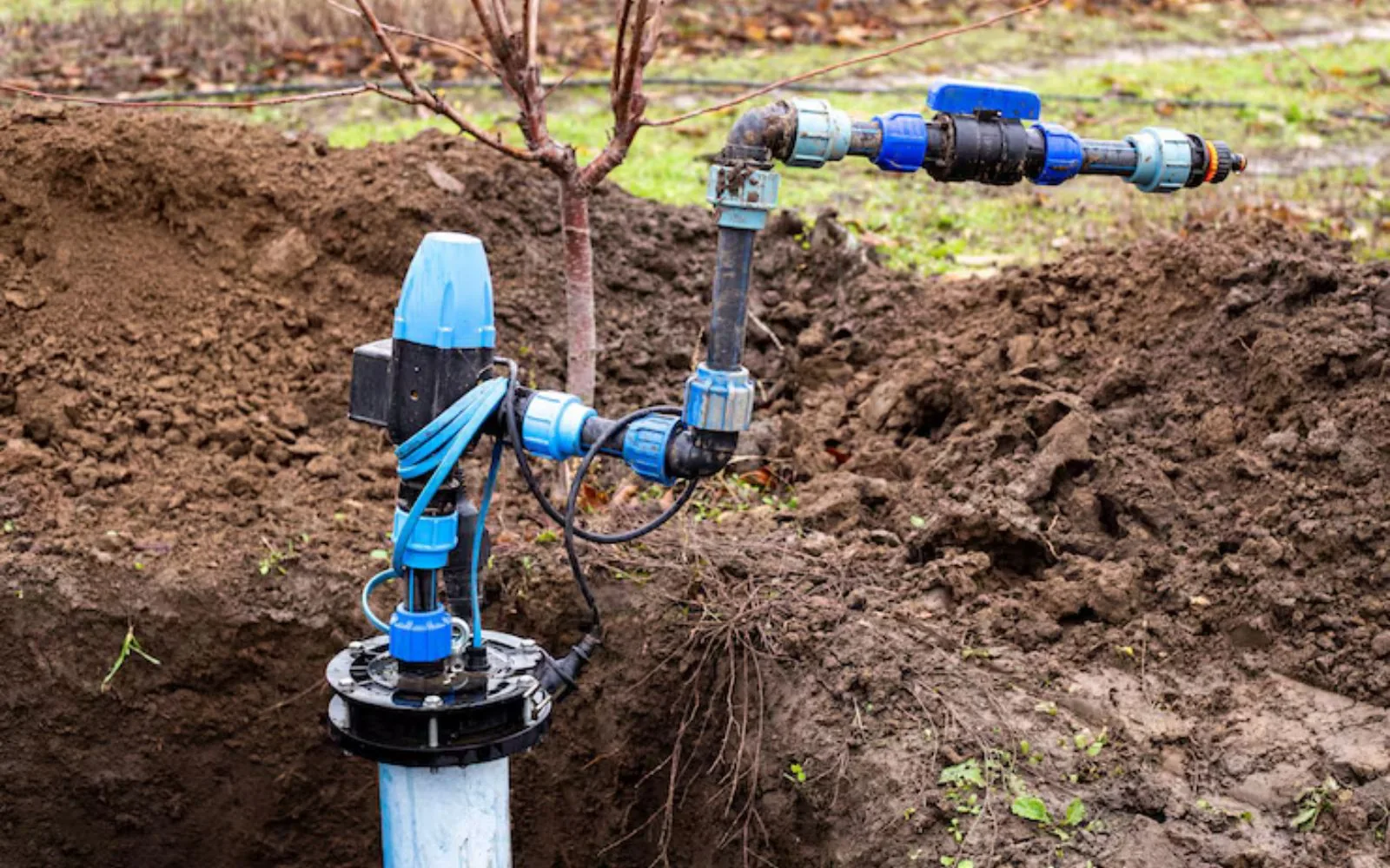Sump pump with discharge piping and shutoff valve installed in a pit for a Pasadena, TX property